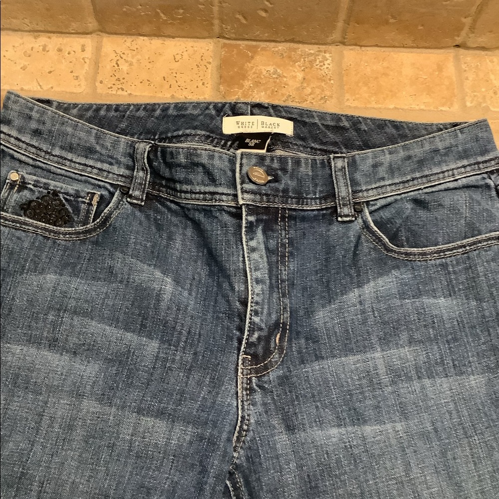 White House Black Market Flare Jeans. Size 8R, 31 inch inseam